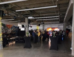 A view of the Foundry room venue at Bayview Yards, decorated for a celebration. 